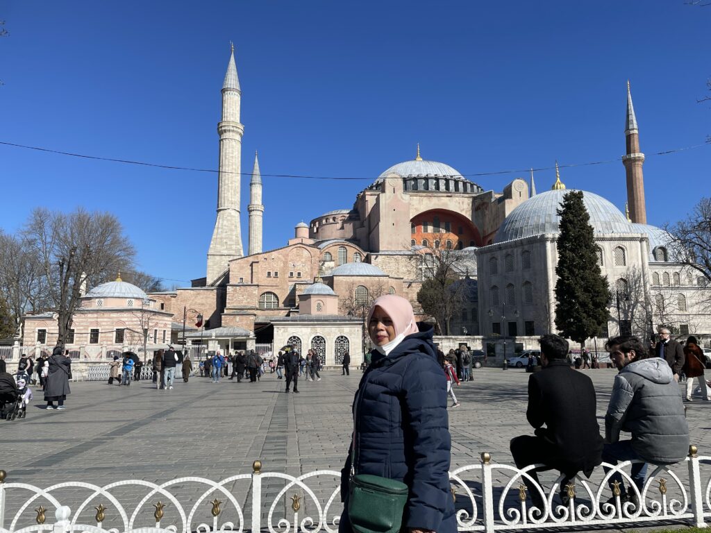 My mom take a photo with Haghia Sophia